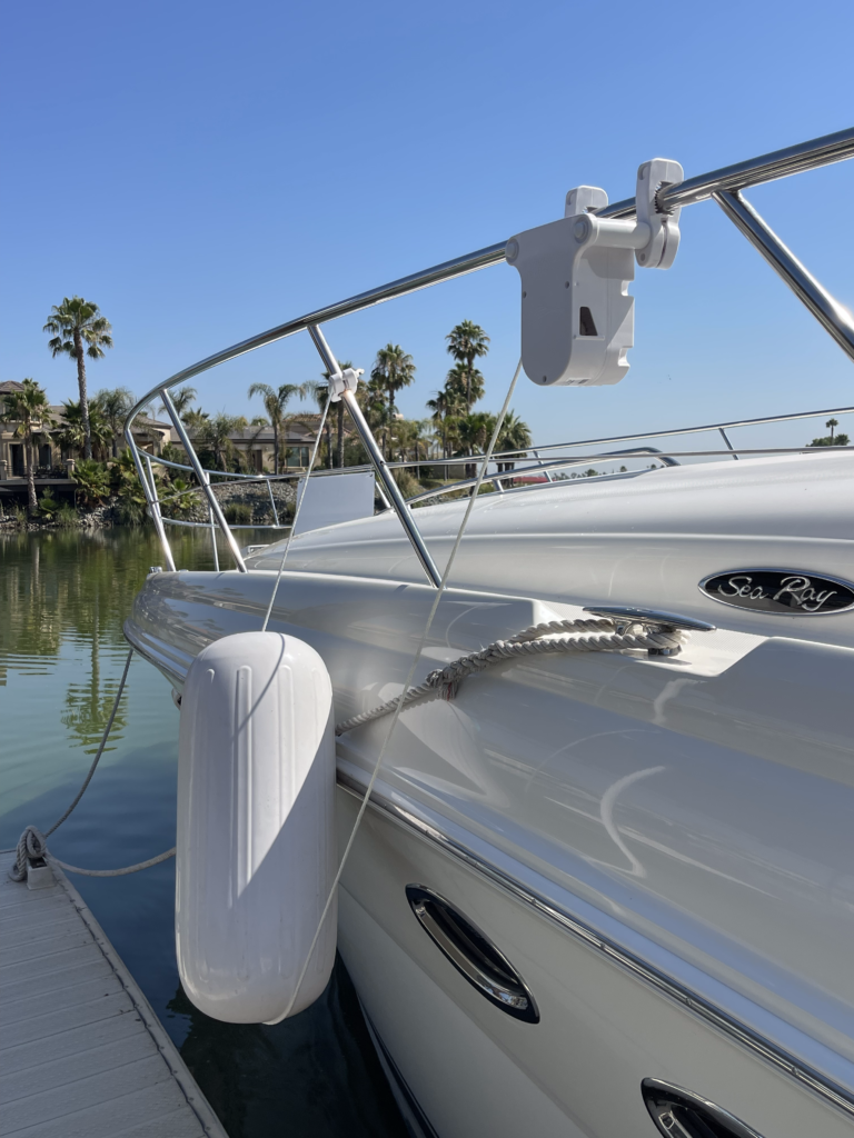 A fender system installed next to a boat fender